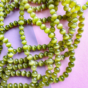 6mm Olive Green Optic Glass Rounds Strand