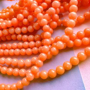 6mm Tangelo Orange Dyed Calcite Round Strand