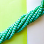 8mm Turtle Green Glass Roller Strand