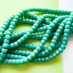 8mm Turtle Green Glass Roller Strand