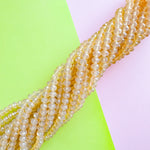 8mm Translucent Peach Tea Faceted Crystal Rondelle Strand