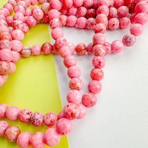 8mm Pink Spotted Dyed Jade Round Strand