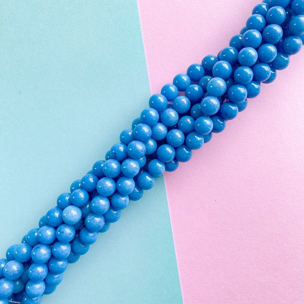 8mm Smooth Blue Dyed Calcite Rounds Strand