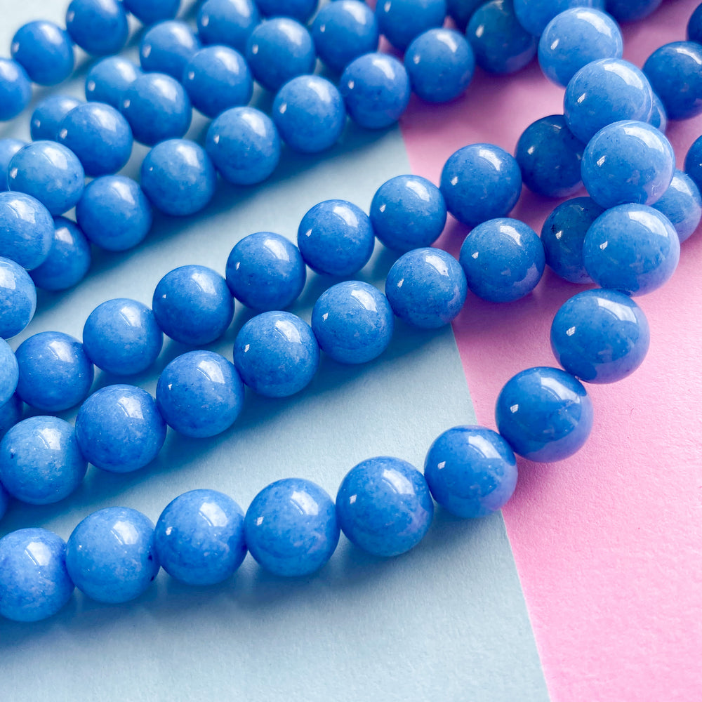 8mm Smooth Blue Dyed Calcite Rounds Strand