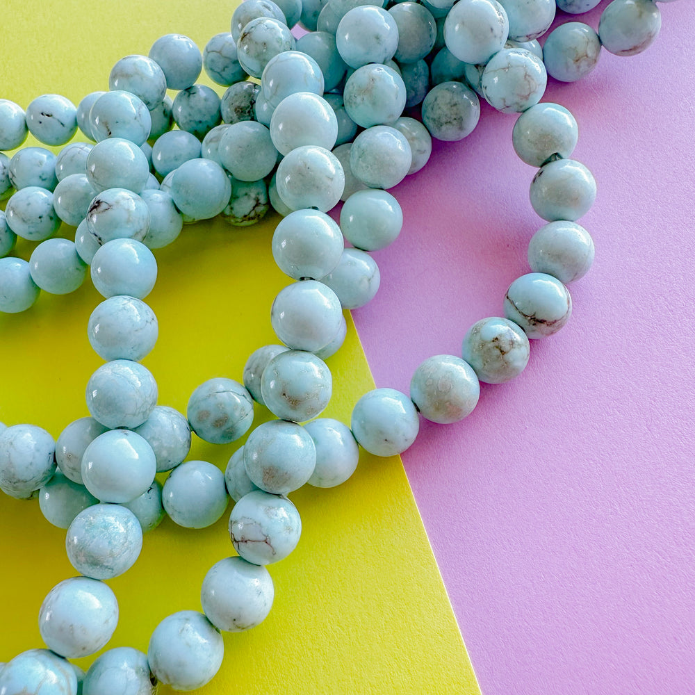 8mm Smooth Turquoise Howlite Rounds Strand