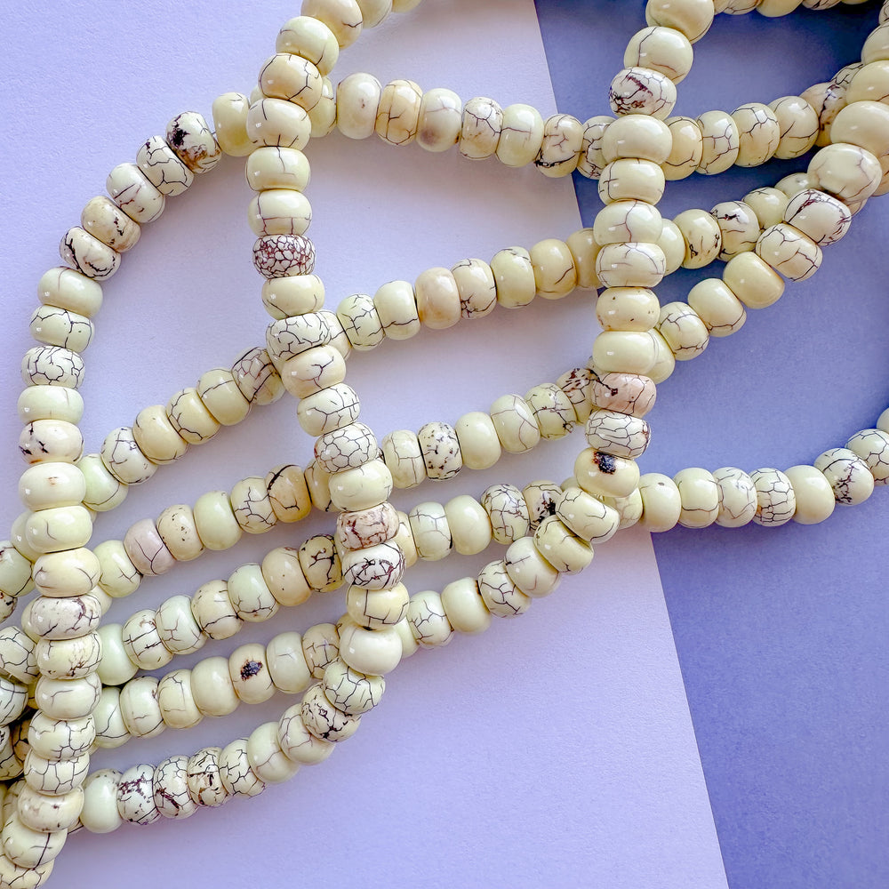 8mm Citron Howlite Rondelle Strand