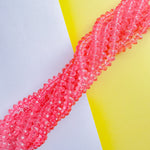 12mm Bright Pink Resin Faceted Rondelle Strand