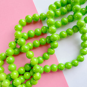 14mm Lime Green Smooth Coated Glass Round Strand