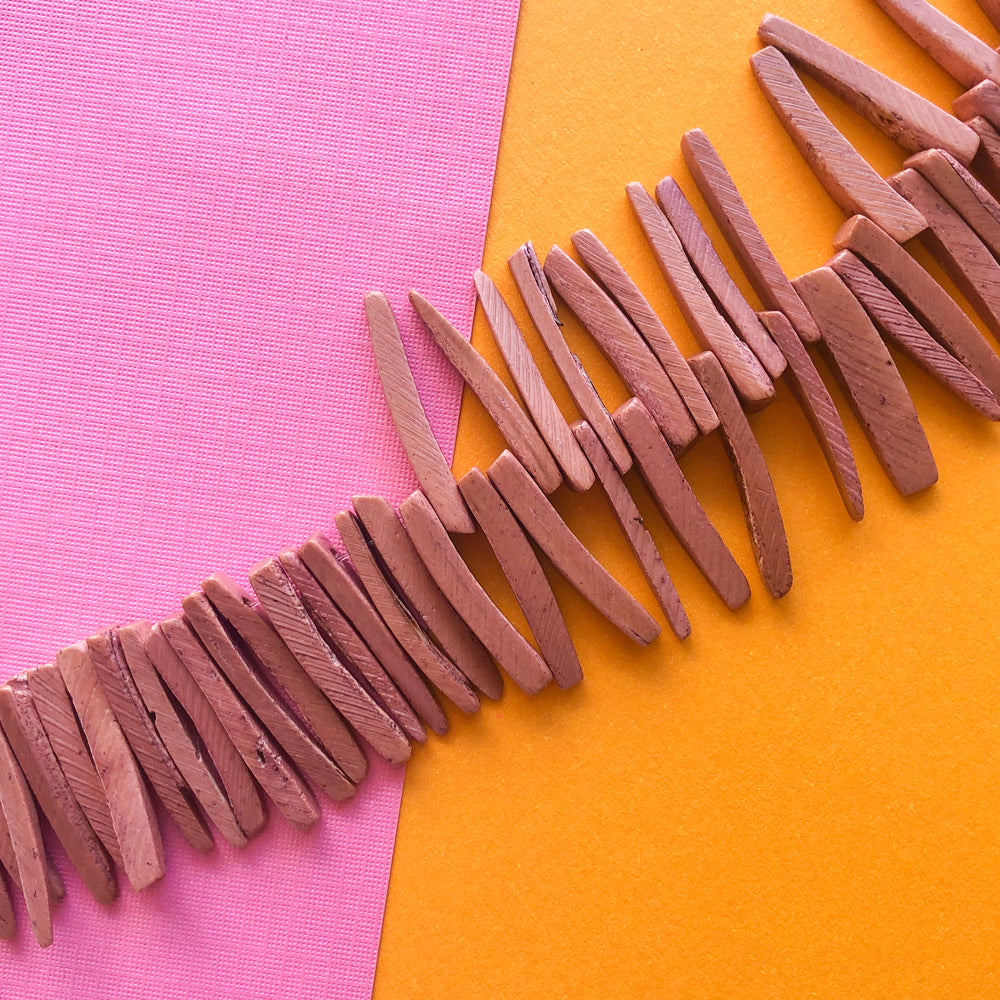 25mm Mauve Wood Spikes Strand - Beads, Inc.