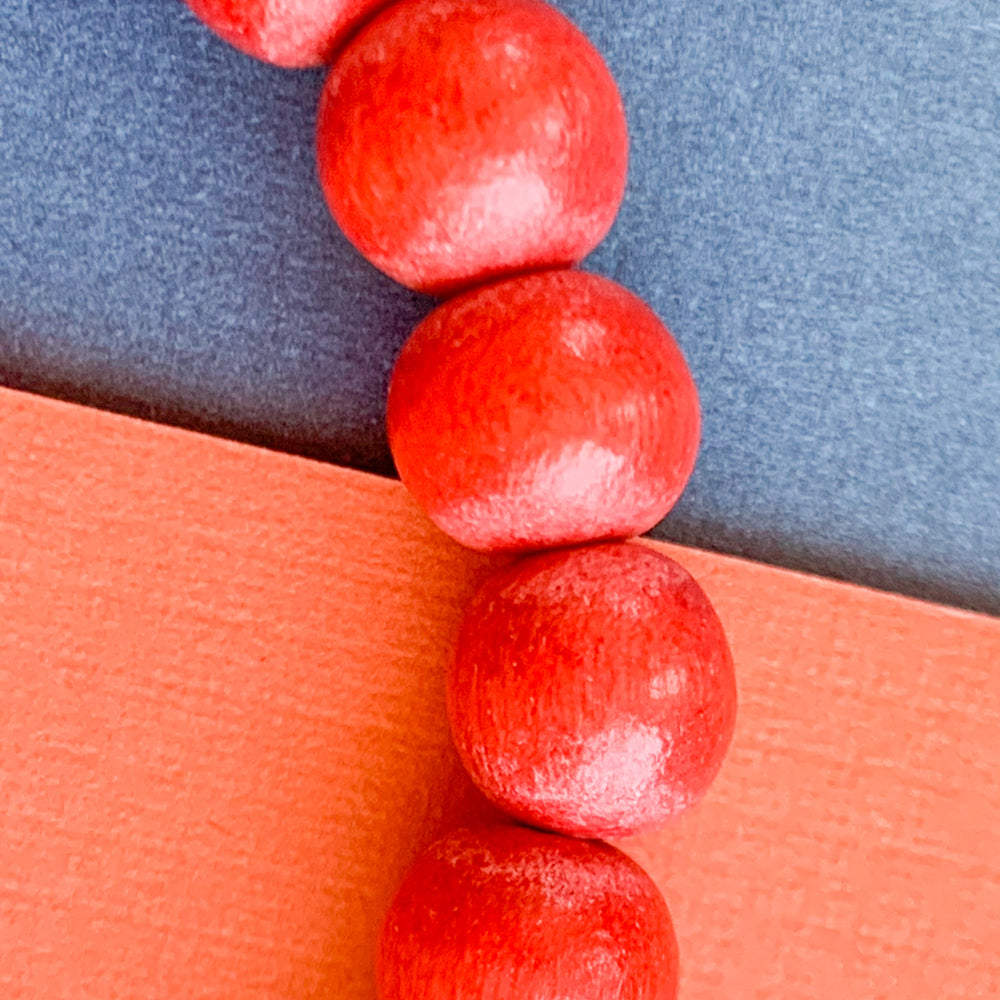 8mm Deep Orange Wood Rounds Strand