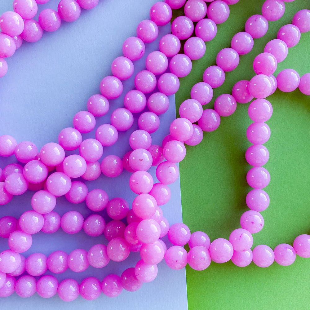 8mm Bubblegum Calcite Rounds Strand