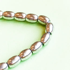 5mm Silver Oval Rice Brass Strand