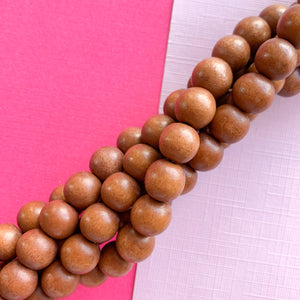 12mm Brown Wood Rounds Strand - Beads, Inc.