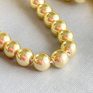 6mm Gold Hematite Rounds Strand