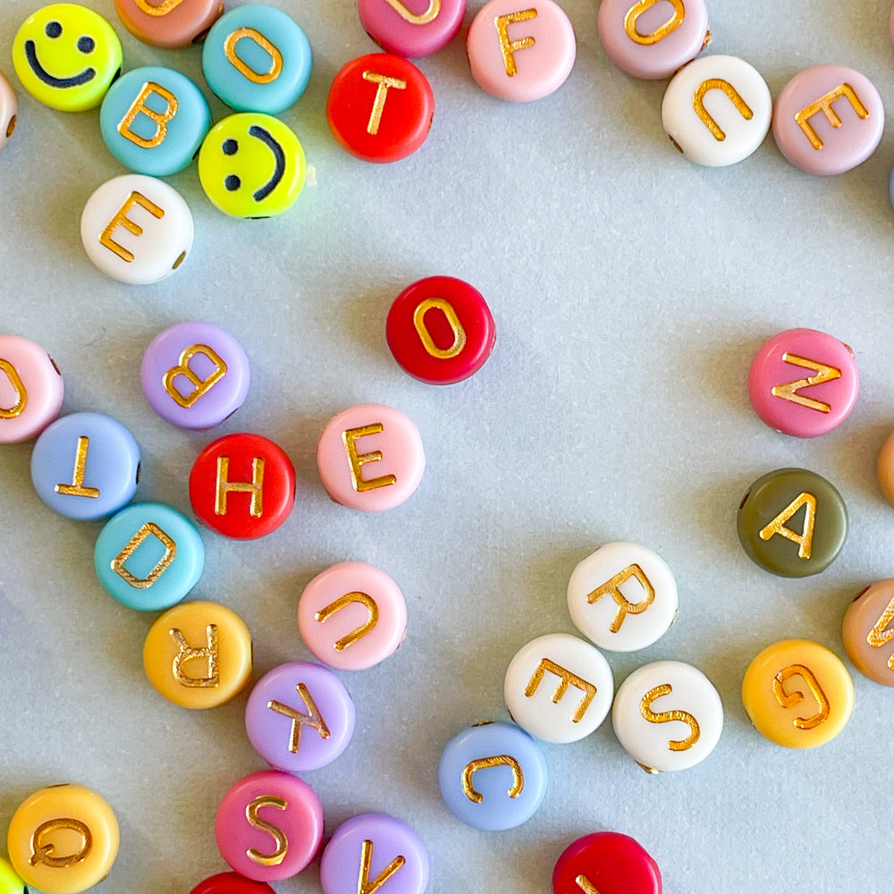 7mm Muted Rainbow Gold Letter Acrylic Coin Bead Pack