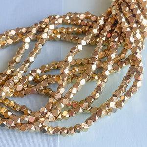 3mm Gold Faceted Brass Nugget Strand