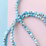 4mm Light Blue Evil Eye Rounds Strand