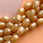 7mm Faceted Tangerine Freshwater Rice Pearl Strand