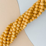 6mm Mustard Yellow Lava Rounds Strand