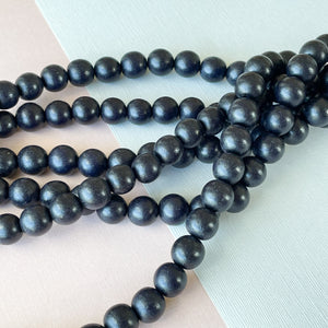 12mm Midnight Wood Rounds Strand - Beads, Inc.