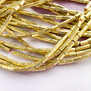 3mm Matte Gold Hematite Hex Cylinder Strand