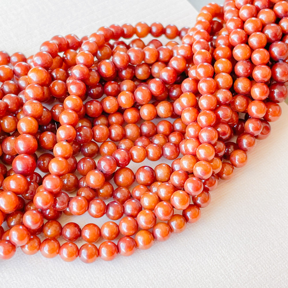 4mm Smooth Bamboo Coral Rounds Strand