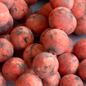 8mm Red Spotted Dyed Jade Rounds Strand