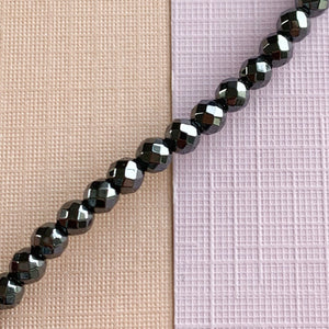 4mm Faceted Gunmetal Hematite Round Strand